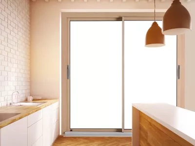 Porte en PVC entre cuisine et jardin installée à Mirande par Entre Portes et Baies